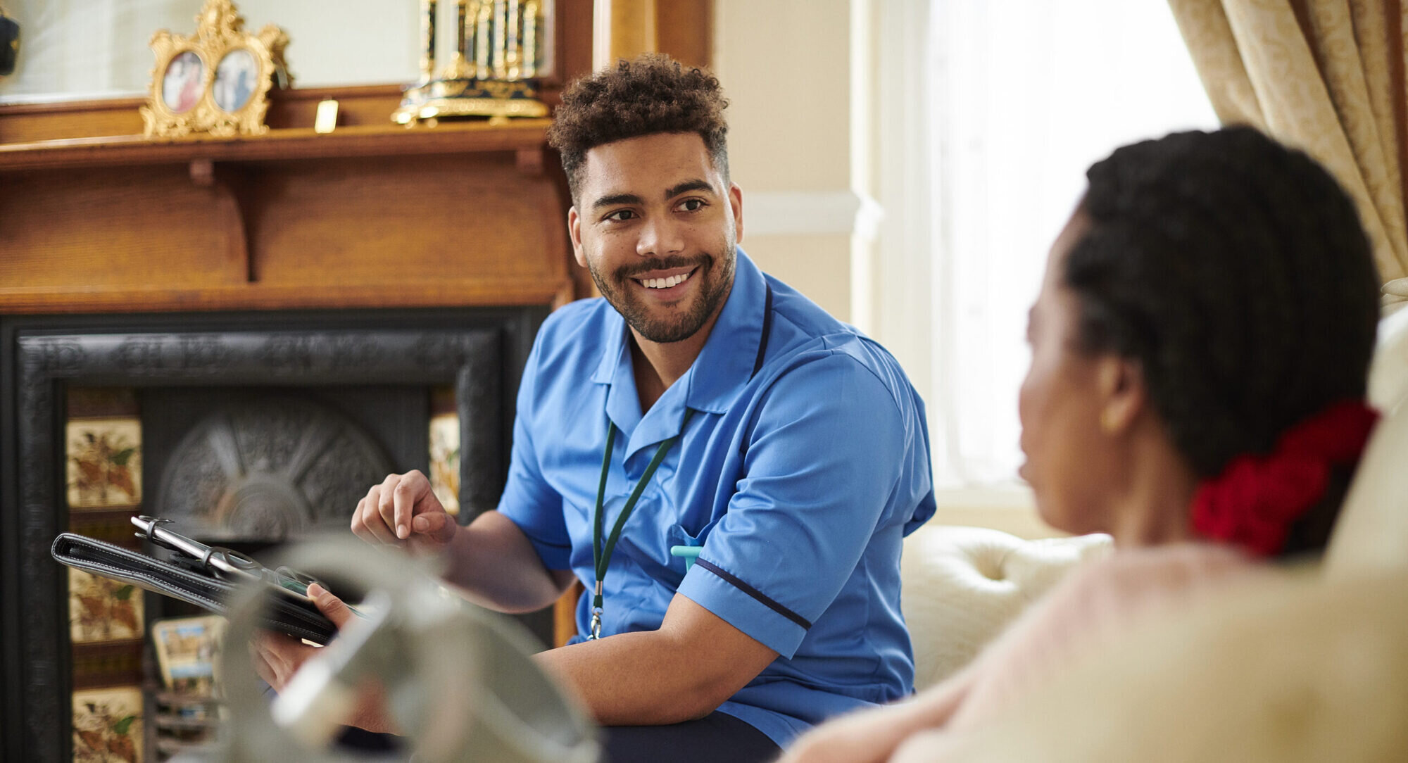 person carer chatting to senior client