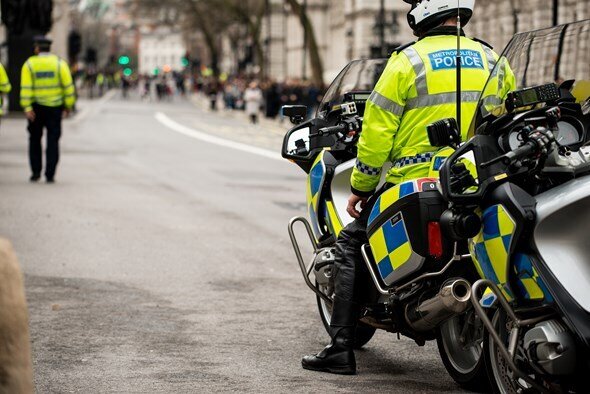 British Police Officer on a stationary Motorbike